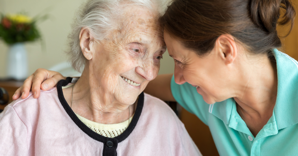 A caregiver giving assistance to the elderly